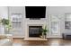 Living room with a fireplace, providing a warm and inviting focal point in the space at 144 Wetherbrooke Ln # 4, Smyrna, GA 30082
