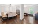 Bright, open living room showcasing hardwood floors and stylish decor at 144 Wetherbrooke Ln # 4, Smyrna, GA 30082
