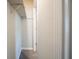 Walk-in closet features carpeted flooring and single shelf with hanger bar at 2132 Sara Ashley Way, Lithonia, GA 30058