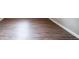 Neutral flooring with standard base trim at 2132 Sara Ashley Way, Lithonia, GA 30058