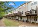 Exterior view highlighting the multiple decks of the townhomes, showing outdoor space at 2513 Ivey Crest Cir, Tucker, GA 30084