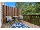 Relaxing deck featuring a table and chairs, perfect for enjoying the outdoors at 2513 Ivey Crest Cir, Tucker, GA 30084