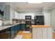 Bright kitchen with an island, ample counter space, and modern appliances at 2513 Ivey Crest Cir, Tucker, GA 30084