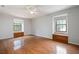 Inviting bedroom with a ceiling fan, hardwood floors and natural light at 620 Shannon Green Sw Cir, Mableton, GA 30126