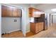 Kitchen featuring wooden cabinets and stainless steel refrigerator with hardwood floors at 620 Shannon Green Sw Cir, Mableton, GA 30126