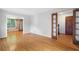 Bright living room with hardwood floors and stylish sliding doors, offering versatile space at 620 Shannon Green Sw Cir, Mableton, GA 30126