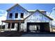 Exterior view of home under construction with visible framing and weather-resistant barriers at 72 Warrior Ct, Braselton, GA 30548