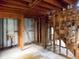 Unfinished basement with exposed wood framing, stairs, and potential for renovation at 10 Hawk Nw Rd, Cartersville, GA 30121