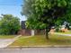 Charming home with a brick facade and a large tree in the front yard at 10 Hawk Nw Rd, Cartersville, GA 30121