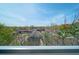 Enjoy expansive views from the balcony, overlooking neighborhood greenery and charming rooftops at 130 Arizona Ne Ave # 309, Atlanta, GA 30307