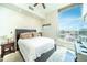Airy bedroom with large windows offering scenic views, plush rug, and comfortable bed at 130 Arizona Ne Ave # 309, Atlanta, GA 30307
