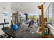 Bright gym equipped with various fitness machines and expansive windows overlooking scenic views at 130 Arizona Ne Ave # 309, Atlanta, GA 30307