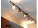 Contemporary track lighting fixture with adjustable spotlights illuminates the ceiling at 130 Arizona Ne Ave # 309, Atlanta, GA 30307