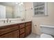 Bathroom with double sink vanity and large mirror at 130 Floss Flower Ct, Roswell, GA 30076