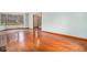 Open living room with hardwood floors and lots of natural light at 130 Floss Flower Ct, Roswell, GA 30076