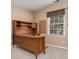Cozy office featuring a wooden desk and natural light at 130 Floss Flower Ct, Roswell, GA 30076