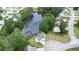Aerial view of a neighborhood of homes showcasing backyard creek access at 1914 Phillips Lake Blf, Lithonia, GA 30058