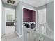 Second floor hallway featuring laundry and carpet at 1914 Phillips Lake Blf, Lithonia, GA 30058