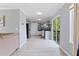 Open-concept kitchen featuring stainless steel appliances, and access to the outdoor deck at 1914 Phillips Lake Blf, Lithonia, GA 30058