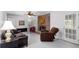 Cozy living room with a brick fireplace and comfortable seating at 2558 Landeau Cir, Tucker, GA 30084