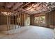 Spacious unfinished basement with insulated ceiling and egress window at 7340 Jamestown Dr, Alpharetta, GA 30005