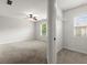 Bright and airy bedroom with a ceiling fan and natural light through the window at 7340 Jamestown Dr, Alpharetta, GA 30005