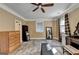 Neutral Primary bedroom with luxury vinyl plank flooring, ceiling fan and natural light at 2230 Cammie Wages Rd, Dacula, GA 30019