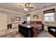 Bedroom with wood-look flooring, ceiling fan, neutral walls, and furniture at 2230 Cammie Wages Rd, Dacula, GA 30019