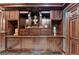 Attractive dark wood built-ins with doors and drawers perfect for showcasing decorations and maximizing storage at 2230 Cammie Wages Rd, Dacula, GA 30019