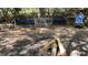 Charming firepit area with custom benches, perfect for outdoor gatherings at 2230 Cammie Wages Rd, Dacula, GA 30019