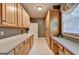 Spacious laundry room with ample storage space, counterspace, and a window at 2230 Cammie Wages Rd, Dacula, GA 30019