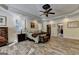 Spacious Primary bedroom featuring LVP flooring, plantation shutters, ceiling fan, and trey ceiling at 2230 Cammie Wages Rd, Dacula, GA 30019