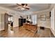 Bright home office with custom shutters, fan lighting, hardwood floors and neutral walls at 2230 Cammie Wages Rd, Dacula, GA 30019