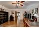 Spacious office features hardwood floors, custom shutters, neutral walls, and a ceiling fan at 2230 Cammie Wages Rd, Dacula, GA 30019