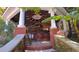 Outdoor pavilion with brick pillars, a brick bar, an overhead fan, and barstools at 2230 Cammie Wages Rd, Dacula, GA 30019