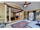 Cozy sunroom featuring many windows for natural light and exterior views with open access to living room at 2230 Cammie Wages Rd, Dacula, GA 30019