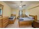 Spacious bedroom with carpet, ceiling fan, and natural light at 3241 Briscoe Rd, Loganville, GA 30052