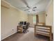 Bedroom with neutral walls, carpet, ceiling fan, and natural light at 3241 Briscoe Rd, Loganville, GA 30052