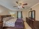 Bedroom featuring a bed, dresser, and window, creating a comfortable retreat at 3241 Briscoe Rd, Loganville, GA 30052