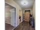 Hallway with decorative wood storage and view of the bedroom at 3241 Briscoe Rd, Loganville, GA 30052