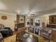 Comfortable living room with a brick fireplace, plush seating, and a welcoming ambiance at 3241 Briscoe Rd, Loganville, GA 30052