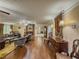 Spacious living room featuring hardwood floors, stylish furnishings, and plenty of room to relax and entertain at 3241 Briscoe Rd, Loganville, GA 30052