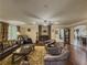 Inviting living room with a cozy fireplace, elegant decor, and plenty of space for relaxation at 3241 Briscoe Rd, Loganville, GA 30052