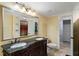 This spacious bathroom features a double sink vanity, granite counters, and modern fixtures at 790 Thornberry Dr, Alpharetta, GA 30022