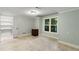 This spacious bedroom features a large window for natural light and a large walk-in closet at 790 Thornberry Dr, Alpharetta, GA 30022