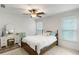 This bedroom features a vanity with great light, natural light, and ample room for a bed and dresser at 790 Thornberry Dr, Alpharetta, GA 30022