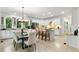 Bright kitchen with white cabinets, stainless appliances, eat in kitchen, and hardwood floors at 790 Thornberry Dr, Alpharetta, GA 30022