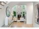 Inviting living room featuring tall ceilings, a fireplace, hardwood flooring, and natural light at 790 Thornberry Dr, Alpharetta, GA 30022