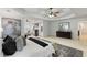 Spacious main bedroom with a sitting area, fireplace, and en-suite bathroom for ultimate comfort and privacy at 790 Thornberry Dr, Alpharetta, GA 30022