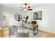 Bright home office with natural light, modern desk and decor, and neutral color palette at 790 Thornberry Dr, Alpharetta, GA 30022